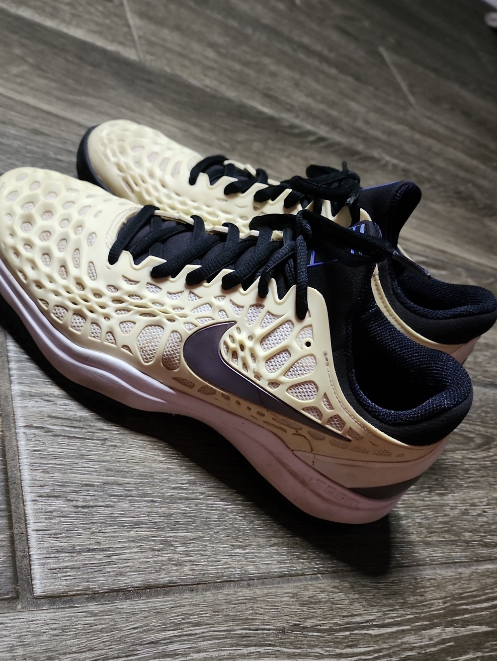 Nike Women's Cream Athletic Sneakers with Black Accents